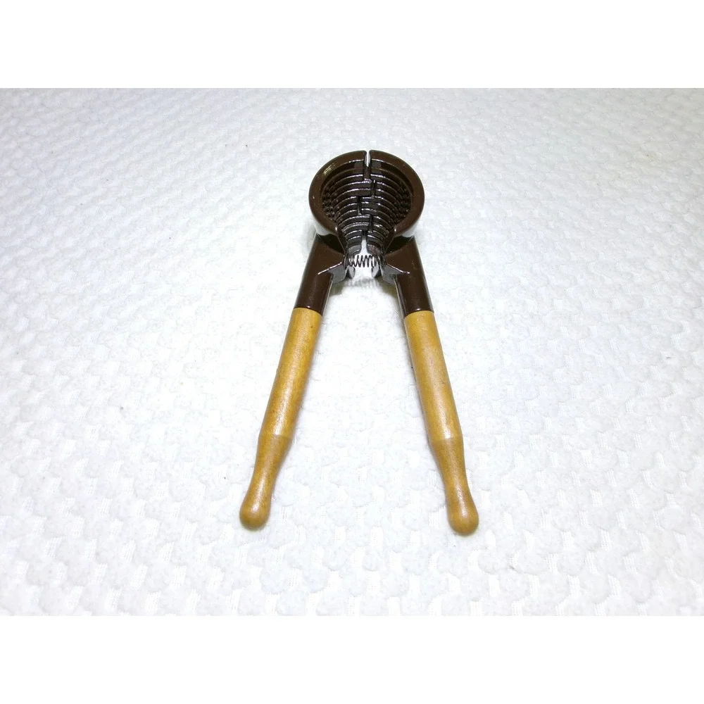 Vintage Spring Loaded Nutcracker‎ Brown Metal with Wood Handles Conical Design